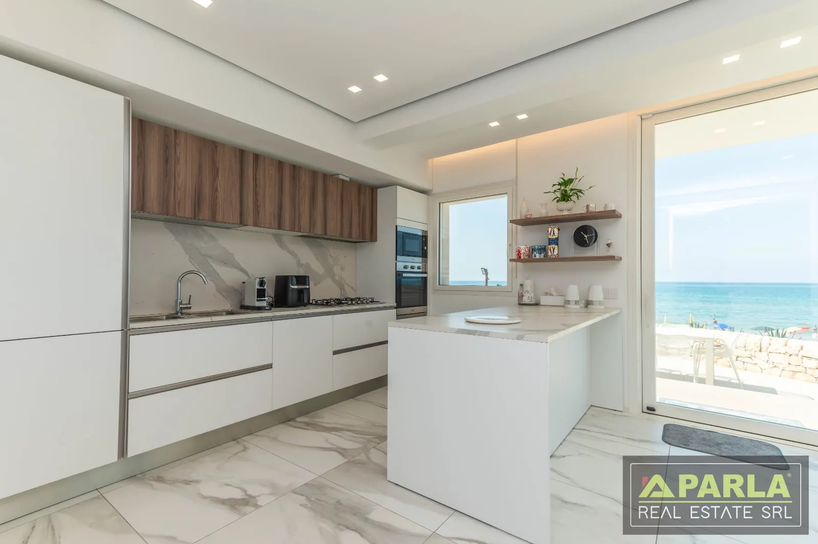 Kitchen opening to the terrace
